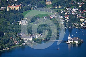 Panoramic view of medieval water castle Schloss Ort Orth on lake Traunsee in Gmunden photo