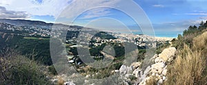 Panoramic view of Mediterranean shore and lebanese coast between Kaslik and Beirut, Lebanon, with natural rocks and vegetation in photo