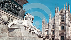 Panoramic view of the Milan city center with sculpture of lion in summer, Italy. Famous Milan Cathedral Duomo di Milano in