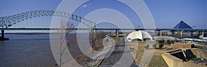 Panoramic view of Mississippi River with Bridge and The Pyramid Sports Arena in skyline, Memphis, TN