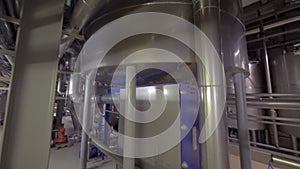 Panoramic view of modern equipment inside brewhouse of brewery