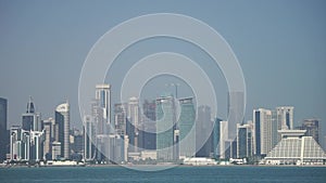 Panoramic view of modern skyline of Doha. Qatar on sunny day