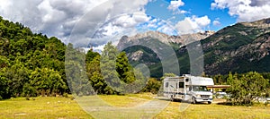 Panoramic view of MOTORHOME RV In Chilean landscape in Andes. Family trip traval vacation in mauntains