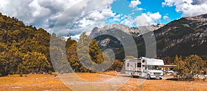 Panoramic view of MOTORHOME RV In Chilean landscape in Andes. Family trip traval vacation in mauntains