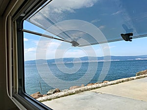 Panoramic view from the motorhome to the sea in the parking lot at the entrance of Nessebar resort, Bulgaria