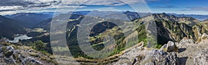 A panoramic view from the mountain Brecherspitze into the Bavarian Alps. To the left lake Spitzingsee, Germany photo