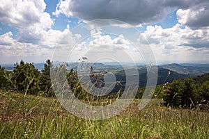 Panoramic view from the mountain peak of the landscape and amazing blue cloudy sky. Divcibare mountain