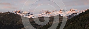 Panoramic view of mountain tops at sunset photo