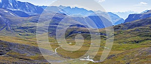 Panoramic view of a mountain valley. Tundra, treeless mountain slopes