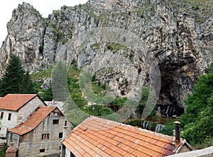 Panoramic view of the mountains, houses and Duman, the spring of the Bistrica River in the small town of Livno in Bosnia and