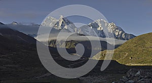 Panoramic view of mountains Kangtega peak Thamserku from Pheriche village . Nepal photo