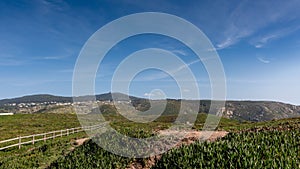 Panoramic view of mountains, meadow, grass, blue sky and clouds on a sunny day, Portugal