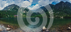 Panoramic view of mountains and Poprad Lake Popradske pleso in High Tatras National Park. Slovakia. Europe. Mountain hiking. Con