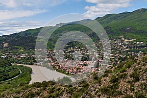 Panoramic view of Mtskheta Mccheta former capital city and one of oldest cities in Georgia on the bank of Kura river with