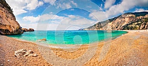 Panoramic view of Myrtos Beach. Sunny morning scene of Cephalonia island, Divarata village location, Greece, Europe. Exciting summ