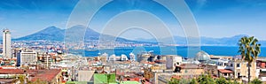 Panoramic view of Naples, Italy. Castel Nuovo and Galleria Umberto I towering over roofs of neighboring houses of Naples