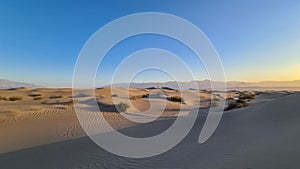 Panoramic view on natural pattern in sand during sunrise at Mesquite Flat Sand Dunes, Death Valley National Park, USA