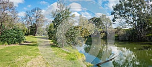 Panoramic view of nature reserve at the riverbank of Werribee River. Beautiful Australian nature landscape with native trees