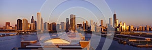 Panoramic view of Navy Pier and Chicago skyline at sunrise, Chicago, IL