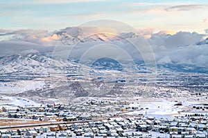 Panoramic view of neighborhood in the scenic valley against a striking mountain