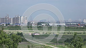 Panoramic view of new buildings and industrial regions of St. Petersburg with Pulkovsky heights