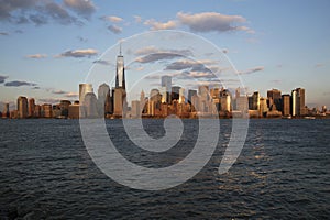 Panoramic view of New York City Skyline on water featuring One World Trade Center (1WTC), Freedom Tower, New York City, New York,