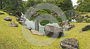 Panoramic view of Ninomaru Garden with ornamental stones in a la