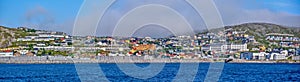 Panoramic view of northern part of Hammerfest, the northernmost town in the world, as seen from the bay. Kvaloya island, Finnmark