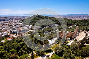 Panoramic view of Odeon of Herodes Atticus stone Roman theater, Herodeion or Herodion, at slope of Acropolis hill with