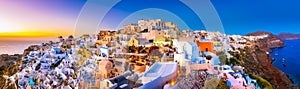 Panoramic view of Oia town, Santorini island, Greece at sunset.