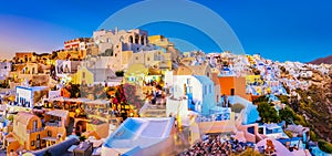 Panoramic view of Oia town, Santorini island, Greece at sunset.