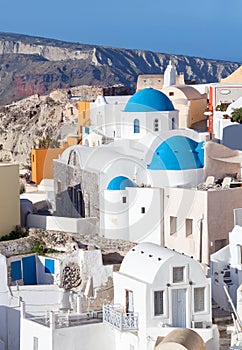 Panoramic view of Oia town at sunset, Santorini island, Cyclades, Greece