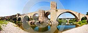 Panoramic view of old bridge over Fluvia river in Besalu