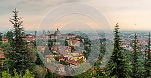 Panoramic view on old city Citta Alta of medieval town Bergamo, Lombardy, Italy on sunrise. Travel destination