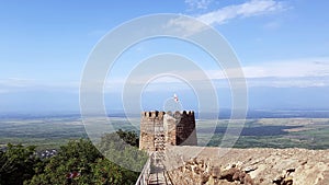 Panoramic view on Old city wall from stones with tower round a city Sighnaghi, Kakheti region, Georgia