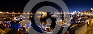 Panoramic view of old harbour of Heraklion with Venetian Koules Fortress at the night. Crete, Greece..Heraklion by night HD panora photo