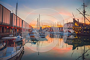 Panoramic view of old port of Genoa at sunset, Liguria, Italy
