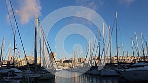 Panoramic view of old port of Marseille with yachts reflected in water, Marseille, France. Taken from hand.