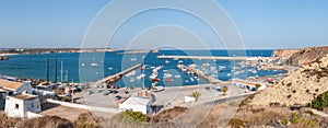 Panoramic view of old port in Sagres with traditional fishing boats