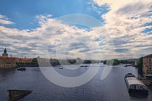 Panoramic view of Old town of Prague in a beautiful sunny day. Ancient colorful buildings, Legion Bridge over Vltava River