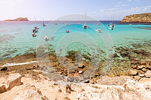 Panoramic view of one of the most beautiful coves Cala Escondida of the island of Ibiza, Balearic Islands. Spain photo