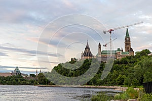 Panoramic view of Ottawa River, Parliament Hill and Alexandra Bridge in Ottawa, Canada