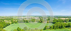 The panoramic view over the city of Ranville in Europe, in France, in Normandy, towards Caen, in Ranville, in summer, on a sunny photo