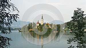 Panoramic view over Lake Bled, Julian Alps and church on the island, sunny day, Bled, Slovenia