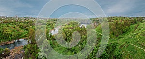 Panoramic view over a landscape of river and forest