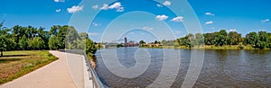 Panoramic view over old cathedral, stars bridge at historical downtown in Magdeburg at Elbe river, city park and new living houses