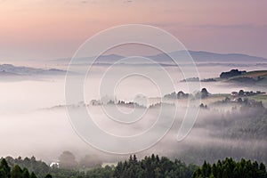 Panoramic View over Rolling Hills in Morning Fog at Sunrise. Lesser Poland