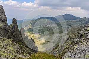 Panoramic view over steep and rocky mountain valley in Retezat National Park, Romania