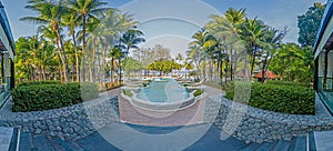 Panoramic view over tropical pool landscape of luxury hotel