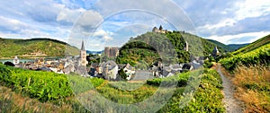 Panoramic view over the village Bacharach with castle and vineyards, Rhine River, Germany